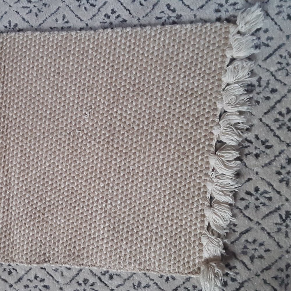 Pair of IKEA Approx. 2x3 Off-White Throw Rugs with Tassels